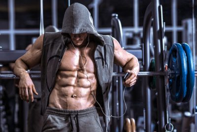 man with ripped abs in the gym