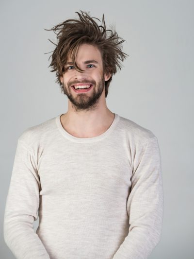 smiling disheveled guy